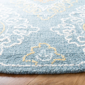 Safavieh Blossom 606 Hand Tufted 80% Wool, 20% Cotton Rug Blue / Yellow 6' x 6' Round