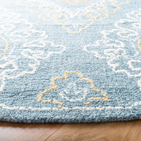 Safavieh Blossom 606 Hand Tufted 80% Wool, 20% Cotton Rug Blue / Yellow 6' x 6' Round
