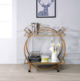 Benzara Metal Serving Cart with Mirrored Open Shelf and Tubular Angled Handles, Gold and Clear BM194342 Gold and Clear Metal, Glass and Mirror BM194342