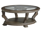 Benzara Traditional Oval Cocktail Table with Glass Top and Wooden Carvings, Brown BM210910 Brown Solid Wood, Veneer, Engineered Wood and Glass BM210910