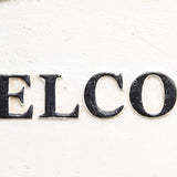 Benzara Oval Metal Frame Wall Sign with Welcome Typography, White and Black BM229313 White and Black Metal BM229313