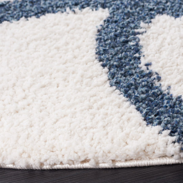 Safavieh Calico Shag 118 Power Loomed Shag & Flokati Rug Ivory / Blue 6'-7" x 9'
