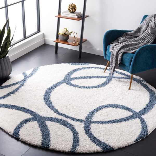 Safavieh Calico Shag 118 Power Loomed Shag & Flokati Rug Ivory / Blue 6'-7" x 9'