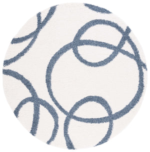 Safavieh Calico Shag 118 Power Loomed Shag & Flokati Rug Ivory / Blue 6'-7" x 9'