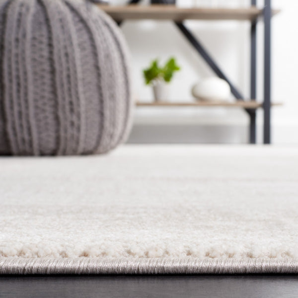 Safavieh Continental 116 Power Loomed Solid & Tonal Rug Ivory / Beige 9' x 12'