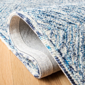 Capri 207  Hand Tufted 100% Wool Pile Rug Ivory / Blue