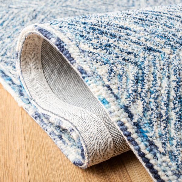 Capri 207  Hand Tufted 100% Wool Pile Rug Ivory / Blue