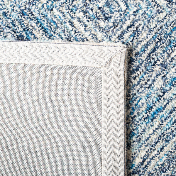 Capri 207  Hand Tufted 100% Wool Pile Rug Ivory / Blue