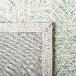 Capri 215  Hand Tufted 100% Wool Pile Rug Blue / Ivory