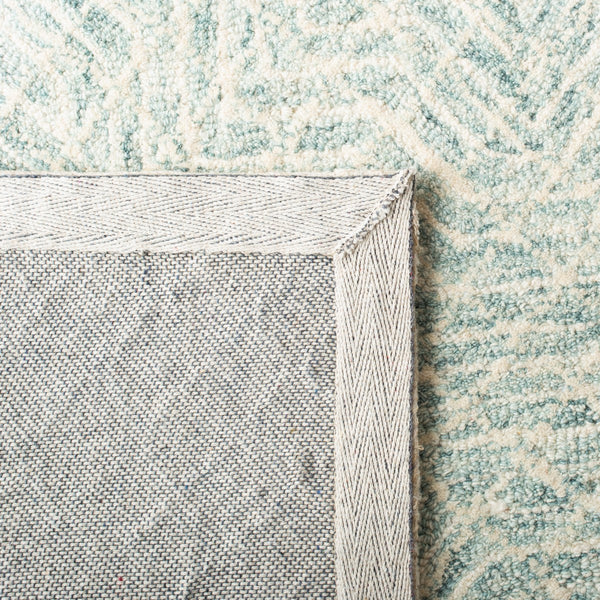 Capri 215  Hand Tufted 100% Wool Pile Rug Blue / Ivory