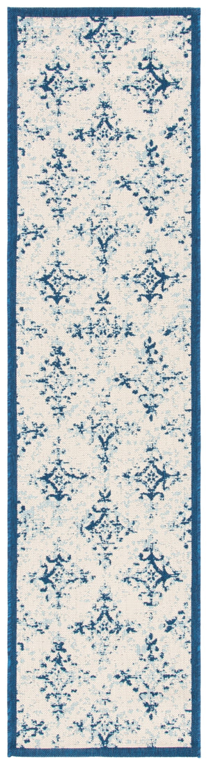 Courtyard 6000 Indoor/Outdoor Power Loomed 85.4% Polypropylene - 10.4% Polyester - 4.2% Latex Rug in Ivory, Navy 8ft x 10ft