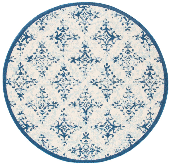 Courtyard 6000 Indoor/Outdoor Power Loomed 85.4% Polypropylene - 10.4% Polyester - 4.2% Latex Rug in Ivory, Navy 8ft x 10ft