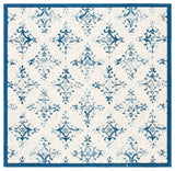 Courtyard 6000 Indoor/Outdoor Power Loomed 85.4% Polypropylene - 10.4% Polyester - 4.2% Latex Rug in Ivory, Navy 8ft x 10ft