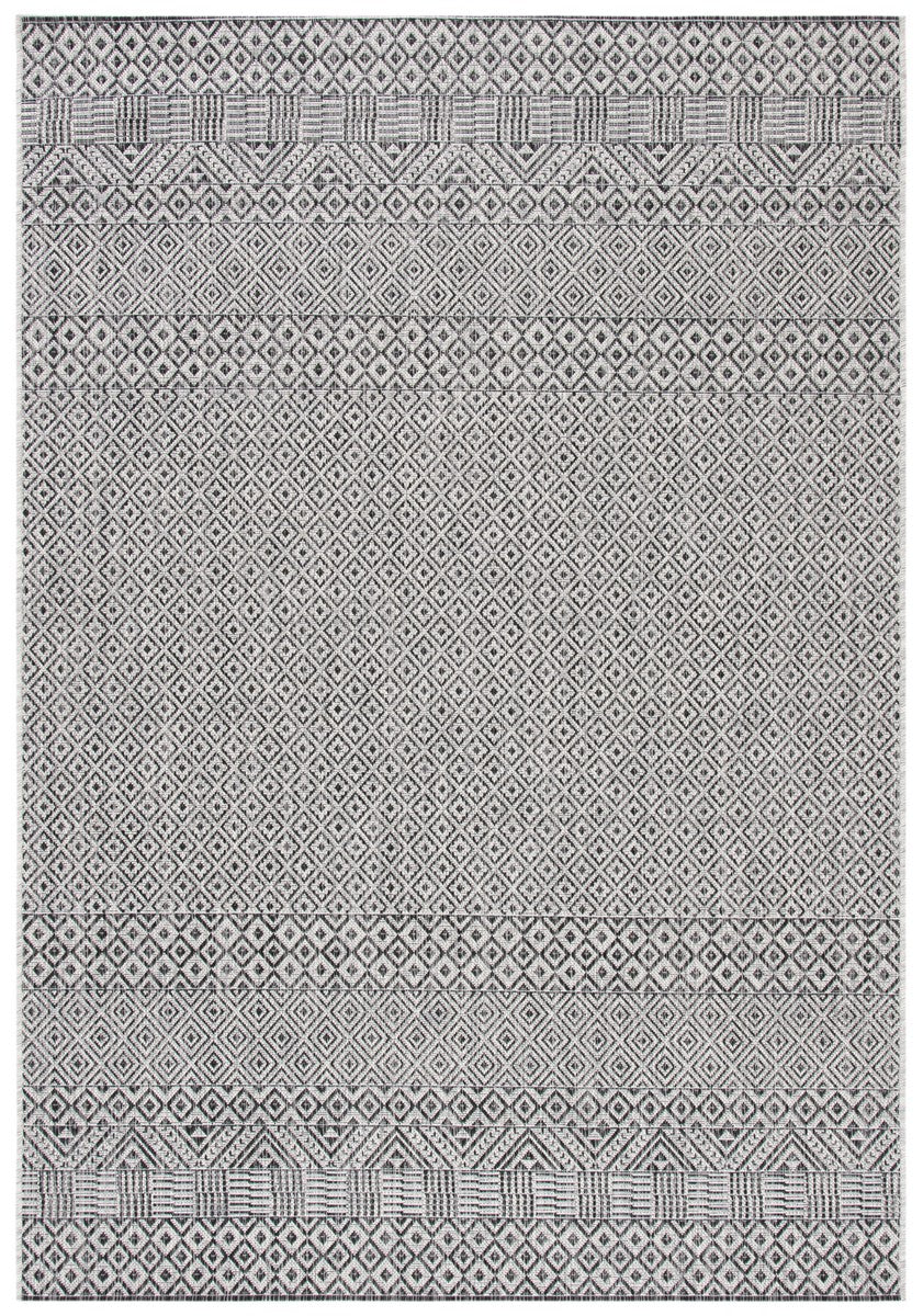 Courtyard  Outdoor Power Loomed 85.4% Polypropylene, 10.4% Polyester, 4.2% Latex Rug Grey / Black