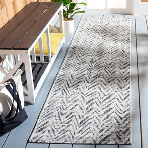 Courtyard 8000 Indoor/Outdoor Power Loomed 85.4% Polypropylene - 10.4% Polyester - 4.2% Latex Rug in Grey, Black 8ft x 10ft