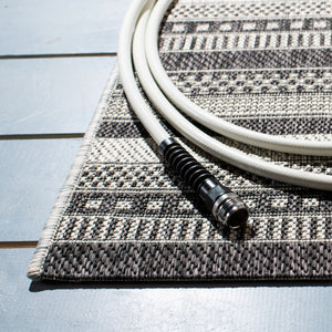 Courtyard  Outdoor Power Loomed 85.4% Polypropylene, 10.4% Polyester, 4.2% Latex Rug Black / Grey