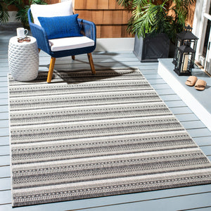 Courtyard  Outdoor Power Loomed 85.4% Polypropylene, 10.4% Polyester, 4.2% Latex Rug Black / Grey