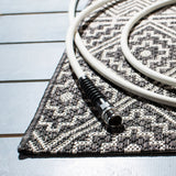 Courtyard  Outdoor Power Loomed 85.4% Polypropylene, 10.4% Polyester, 4.2% Latex Rug Black / Grey