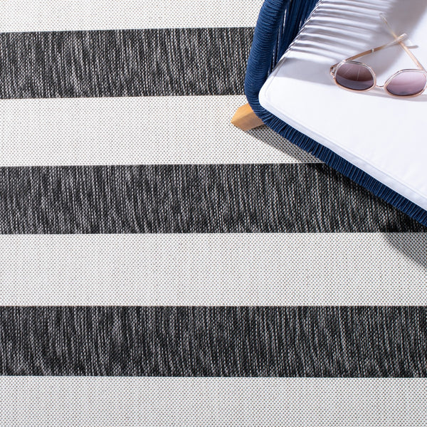 Safavieh Courtyard 8812 Power Loomed 85.4% Polypropylene/10.4% Polyester/4.2% Latex Outdoor Rug CY8812-53712-5