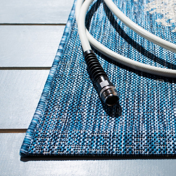 Courtyard 8893 Outdoor Power Loomed 85.4% Polypropylene, 10.4% Polyester, 4.2% Latex Rug Navy / Grey