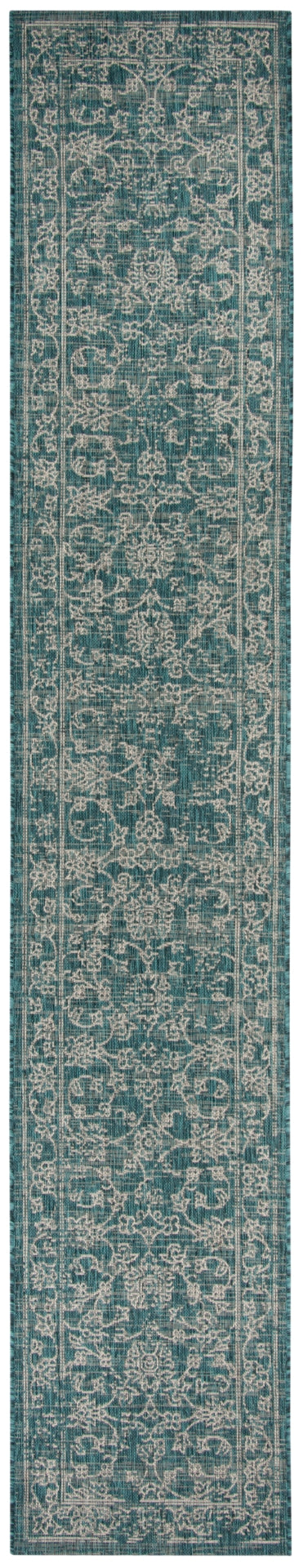 Courtyard Miami Vintage Outdoor Power Loomed 85.4% Polypropylene - 10.4% Polyester - 4.2% Latex Rug in Turquoise 5ft x 7ft
