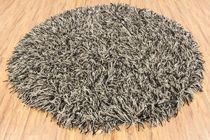 Chandra Rugs Cyrah 100% Wool Hand-Woven Contemporary Shag Rug Black/Taupe/Ivory 7'9 Round