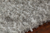 Chandra Rugs Dior 100% Polyester Hand-Woven Contemporary Shag Rug White/Black 9' x 13'