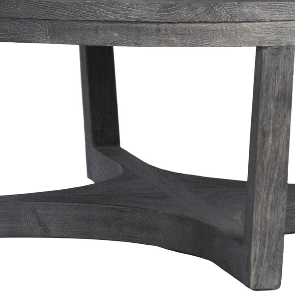 Dovetail Clovis 55" Round Oak Coffee Table with a Black Burnt Finish DOV13062