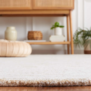 Safavieh Ebony 109 Modern Hand Tufted Rug Gold / Ivory EBN109D-5