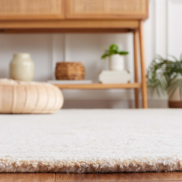 Safavieh Ebony 109 Modern Hand Tufted Rug Gold / Ivory EBN109D-5