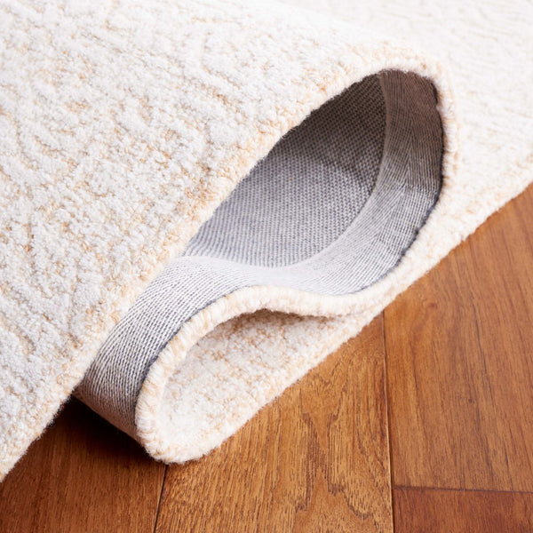 Safavieh Ebony 109 Modern Hand Tufted Rug Gold / Ivory EBN109D-5