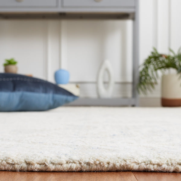 Safavieh Ebony 111 Antique Hand Tufted Rug Blue / Ivory EBN111M-8