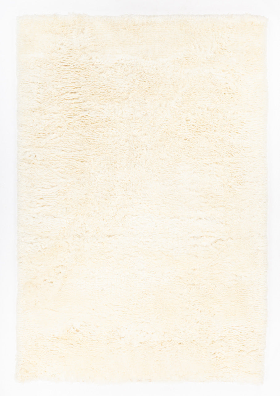 Chandra Rugs Ezmae 100% Wool Hand-Woven Solid Shag Rug Ivory 7'9 x 10'6