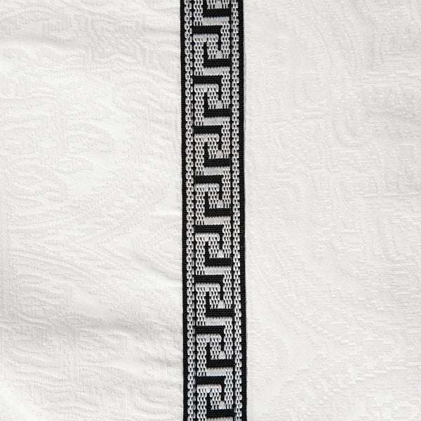 HiEnd Accents Liza White Matelassé Coverlet Set FB4162-SQ-OC Cream, Tan, Black Coverlet - Face: 68% viscose, 32% polyester; Back: 100% cotton. Bed Skirt - Skirt: 100% polyester; Decking: 100% polyester. Pillow Sham: 68% viscose, 32% polyester. 92x96x3