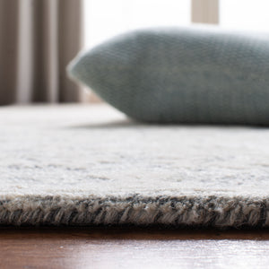 Safavieh Glamour 551 Hand Tufted 75% Viscose/25% Wool Rug GLM551F-9