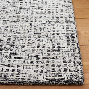 Safavieh Glamour 601 Modern Hand Tufted Rug Black / Ivory GLM601Z-8