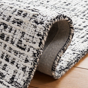 Safavieh Glamour 601 Modern Hand Tufted Rug Black / Ivory GLM601Z-8