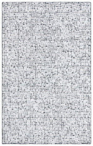 Safavieh Glamour 601 Modern Hand Tufted Rug Black / Ivory GLM601Z-8