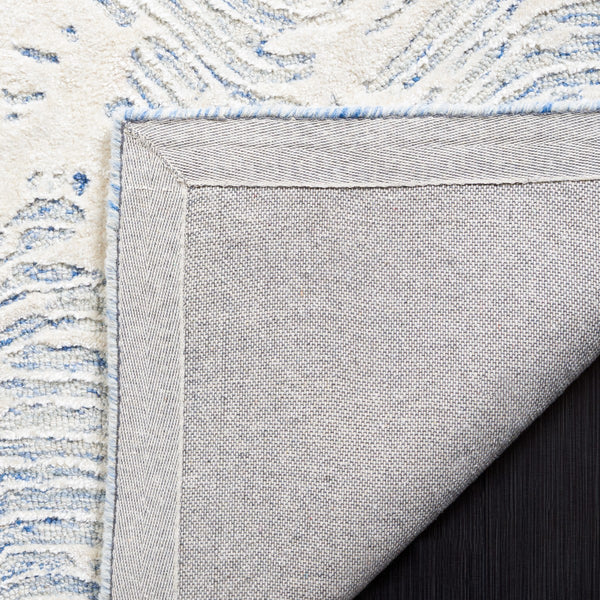 Safavieh Glamour 605 Modern Hand Tufted Rug Blue / Ivory GLM605M-8