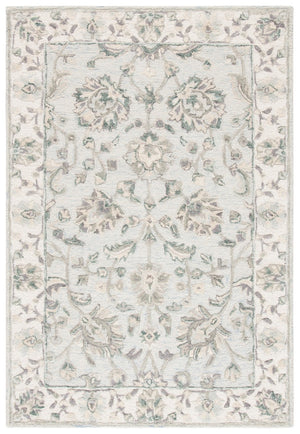 Glamour 628  Hand Tufted 100%Wool Pile Rug Light Blue / Ivory