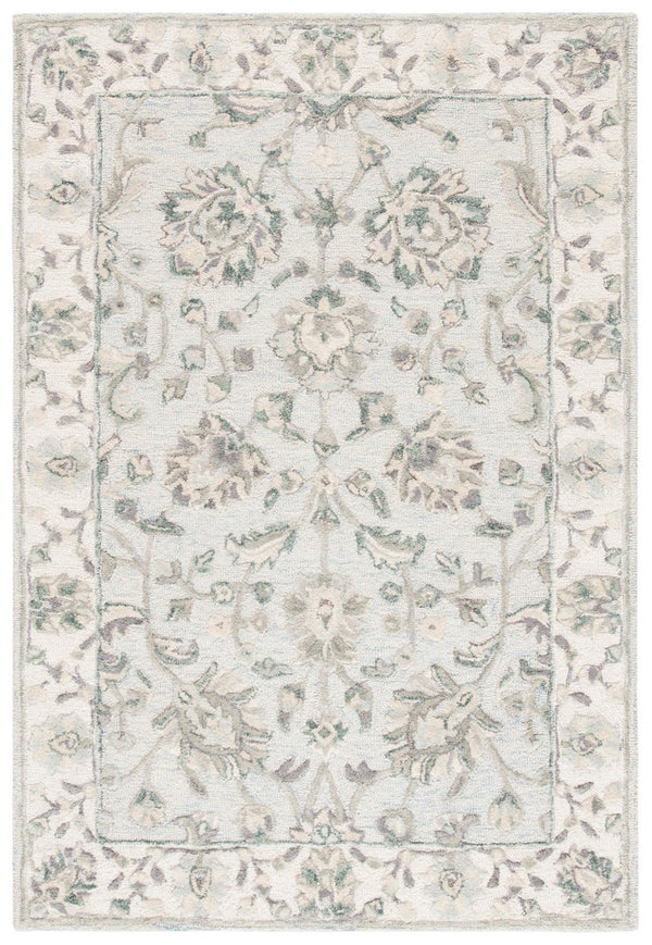 Glamour 628  Hand Tufted 100%Wool Pile Rug Light Blue / Ivory