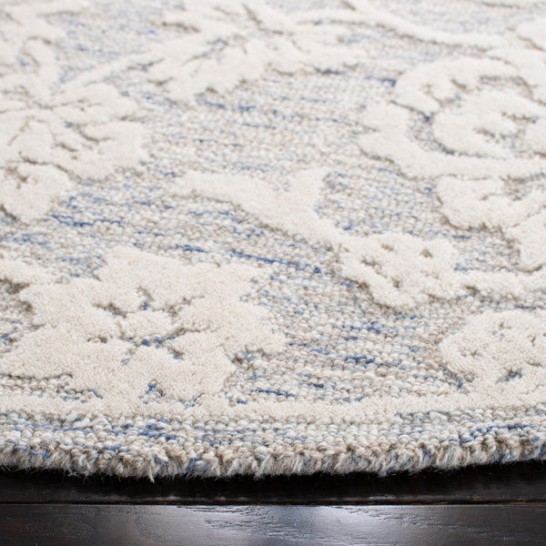 Glamour 651  Hand Tufted 100% Wool Pile Rug Blue / Ivory