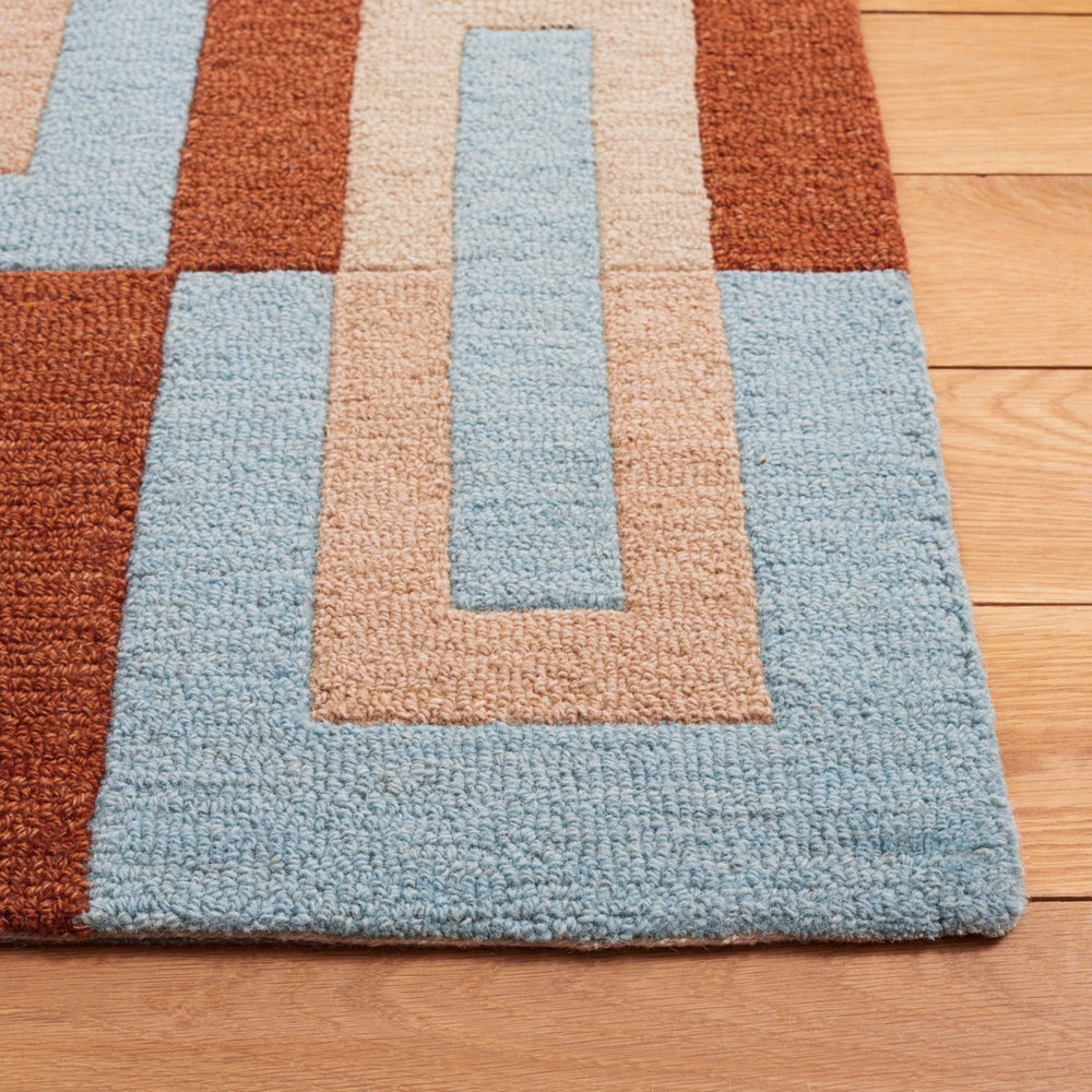 Safavieh Genre 102 Hand Tufted Modern Rug Light Blue / Rust 8' x 10'