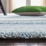 Hollywood 703 Contemporary Power Loomed 100% Polypropylene Rug Ivory / Blue