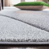 Hollywood 716 Contemporary Power Loomed 100% Polypropylene Rug Grey / Orange