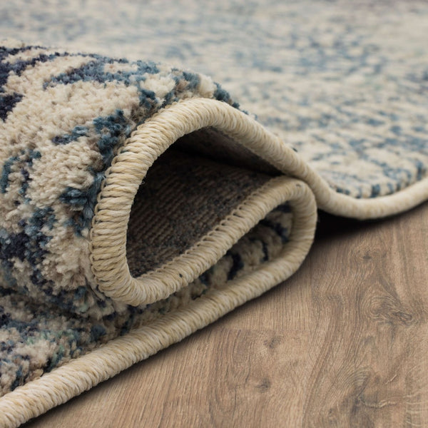 Karastan Rugs Imprinted Blooms Aqua 9' 6" x 12' 11" Area Rug