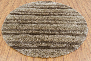 Chandra Rugs Kapaa 75% Wool + 25% Polyester Hand-Woven Contemporary Shag Rug Tan/Ivory/Taupe 7'9 Round