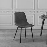 Monte Contemporary Dining Chair in Charcoal Faux Leather with Black Powder Coated Metal Legs