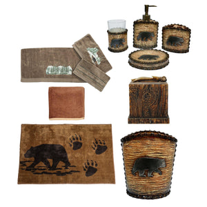 HiEnd Accents Lodge Bear Bathroom Lifestyle Set LF3110B1  Towel Set: 100% cotton; Washcloth: 95% cotton, 5% polyester; Countertop Bathroom Set and Wastebasket: Resin; Rug: 100% acrylic with anti-slip latex backing; Tissue Box Cover: Polyresin 