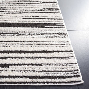 Safavieh Melody 116 Modern Power Loomed Rug Ivory / Black MEL116A-9